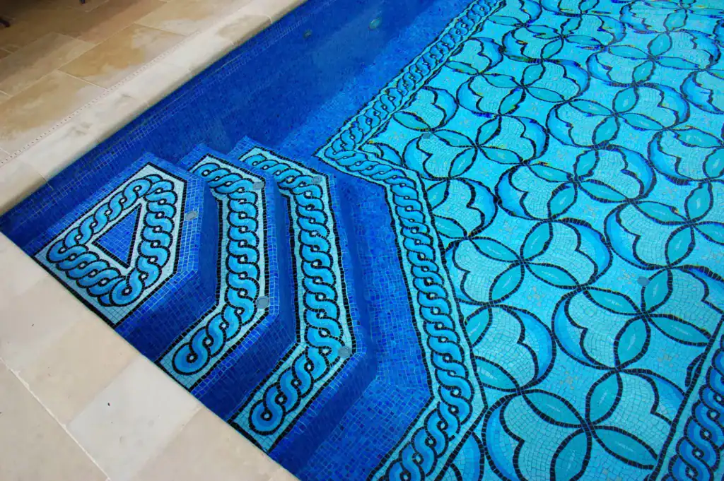 In floor cleaning system on steps of mosaic pool | Mosaic Pool tile