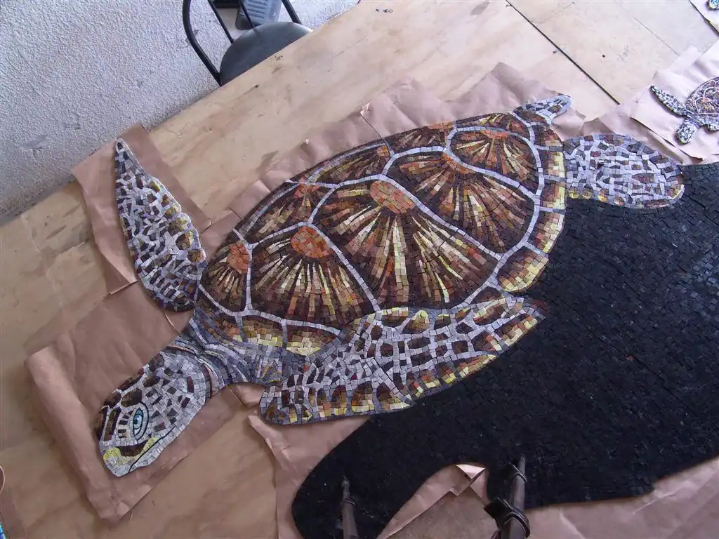 Turtle pool mosaic with vibrant colors and intricate details, perfect for transforming your pool int.